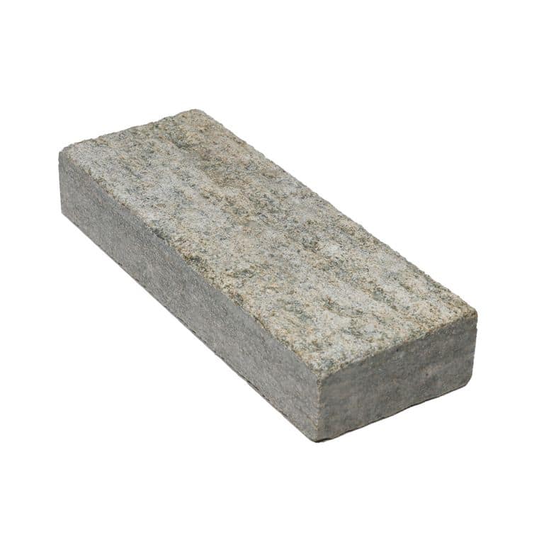 Color/Finish variation image for Pietra Italia Gneiss - Sandblasted Cobblestones. The surface finish shown is sand blasted. Dominant colors shown are gray and tan. The color mix creates a warm feeling.