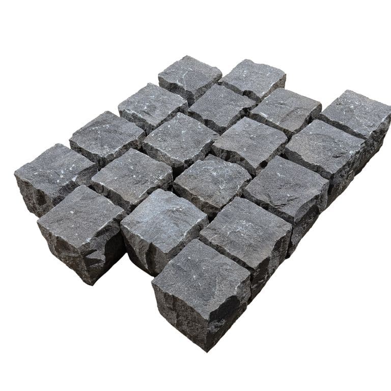 Feature image for Highland Limestone Cobblestones - Square - Split Top, Split Sides. The surface finish shown is split-face. Dominant colors shown are black and gray. The color mix creates a cool feeling.