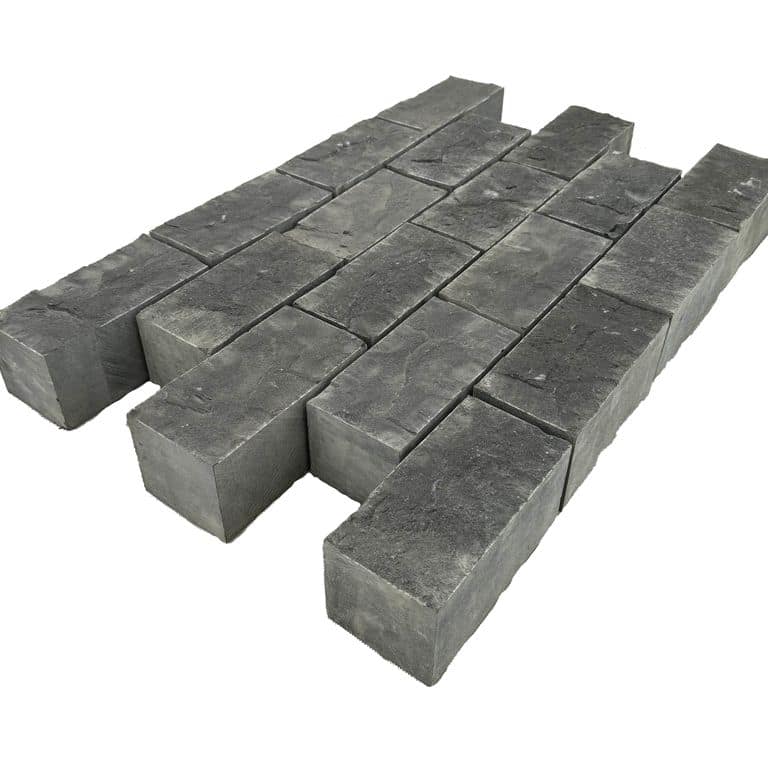 Feature image for Limestone - Highland Cobblestones - Rectangle - Split Top, Sawn Sides. The surface finish shown is split-face. The dominant color shown is black. The color mix creates a cool feeling.