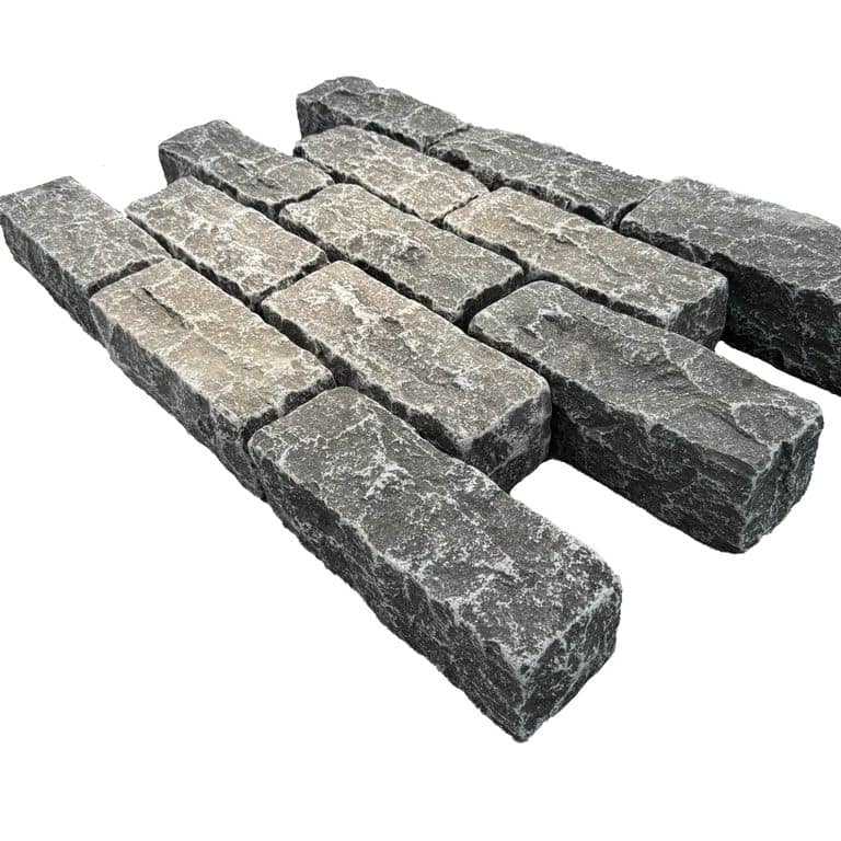Feature image for Limestone - Highland Cobblestone - Rectangle - Split +Tumbled Top, Split +Tumbled Sides. The surface finish shown is . Dominant colors shown are black and gray. The color mix creates a cool feeling.