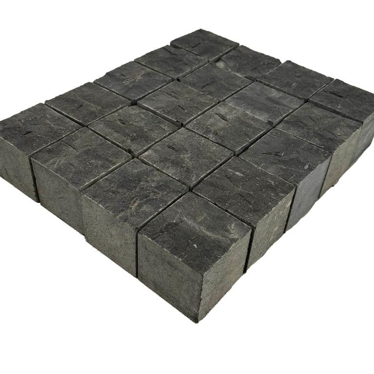 Feature image for Limestone - Highland Cobblestones - Square - Split Top, Sawn Sides. The surface finish shown is split-face. The dominant color shown is black. The color mix creates a cool feeling.