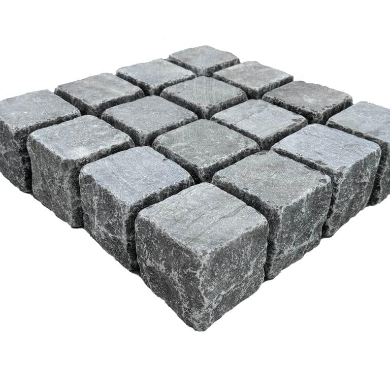Feature image for Highland Limestone Cobblestones - Square - Sawn + Tumbled Top, Split + Tumbled Sides. The surface finish shown is . The dominant color shown is gray. The color mix creates a cool feeling.