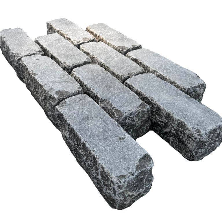 Feature image for Limestone - Highland Cobblestones - Rectangle - Sawn + Tumbled Top, Split + Tumbled Sides. The surface finish shown is . The dominant color shown is gray. The color mix creates a cool feeling.