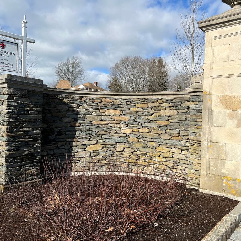 Application image for New England Fieldstone Flats - Veneer. The image shows this product being used in a thin veneer application. The surface finish shown is weathered. Dominant colors shown are gray and tan. The color mix creates a warm feeling.