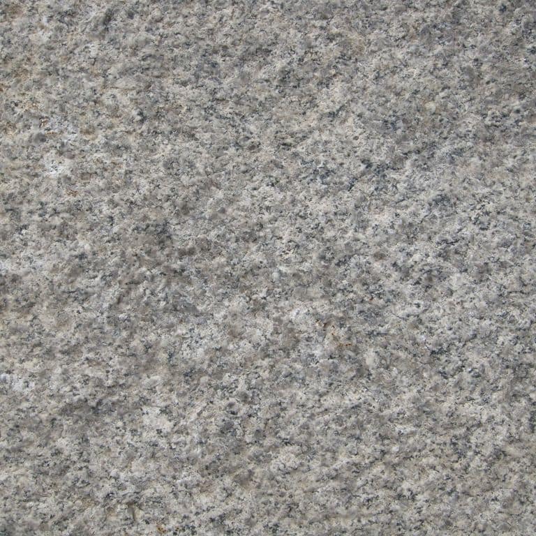 Color/Finish variation image for Granite - Reclaimed Footworn - Interior Plank Paver. The surface finishes shown are coarse free form bush hammered, weathered and worn. The dominant color shown is gray; with beige, green, purple and white secondaries. The color mix creates a cool feeling. Speckled and cloudy color patterns.