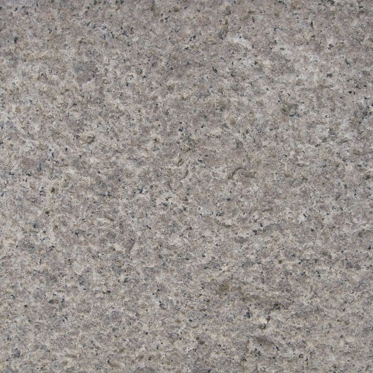Color/Finish variation image for Granite - Reclaimed Footworn - Interior Plank Paver. The surface finish shown is . The dominant color shown is gray; with beige and purple secondaries. Exhibits "movement" and the color mix creates a cool feeling. Speckled and cloudy color patterns.
