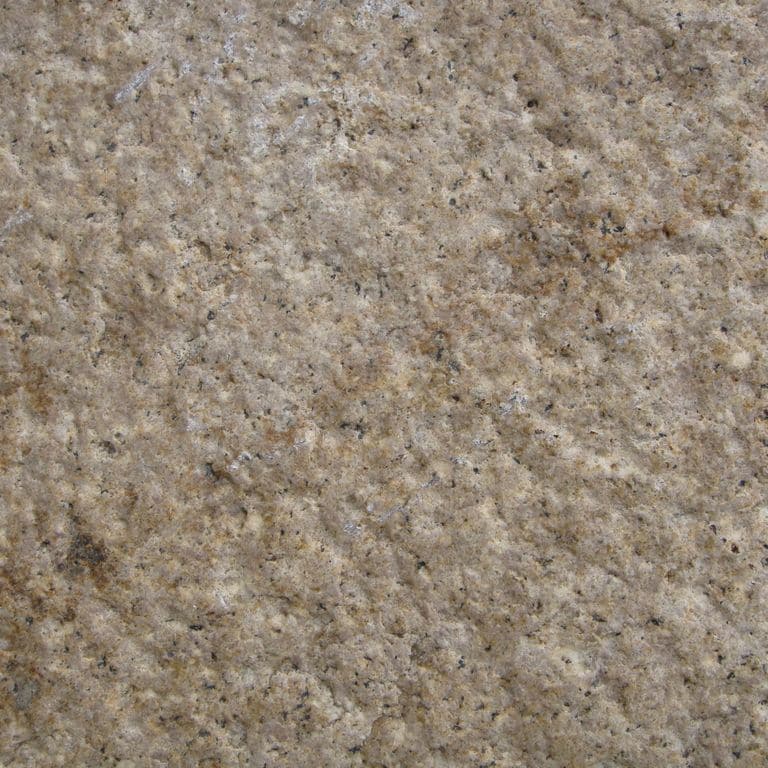 Color/Finish variation image for Granite - Reclaimed Footworn - Interior Plank Paver. The surface finishes shown are coarse free form bush hammered, weathered and worn. Dominant colors shown are brown and gray; with green, orange/rust, purple and tan secondaries. The color mix creates a warm feeling. Coarse speckled color pattern.
