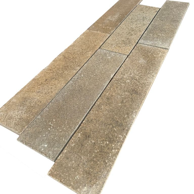 Feature image for Reclaimed Footworn Granite - Interior Plank Paver. Dominant colors shown are gray and tan; with beige, pink, purple, white, tan and cream secondaries. Exhibits "movement" and the color mix creates a warm feeling. Speckled, blotched, random and cloudy color patterns.
