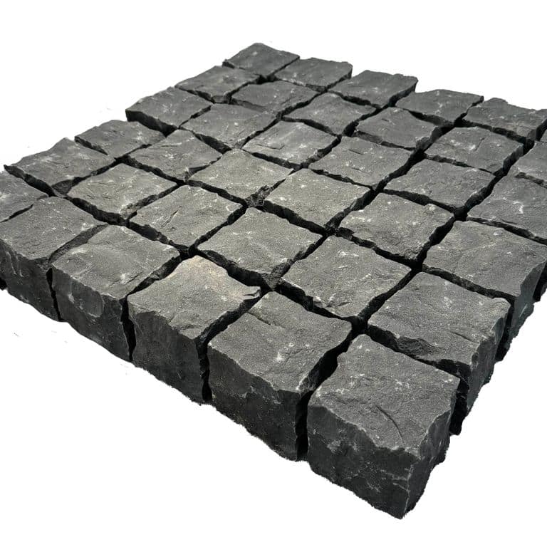 Application image for Nordic Black Basalt Cobblestones - Cubes - Split Top, Split Sides. The surface finish shown is split-face. Dominant colors shown are black and gray. The color mix creates a cool feeling.
