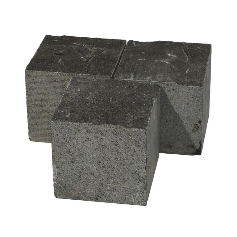Feature image for Nordic Black Basalt Cobblestones - Cubes - Split Top, Sawn Sides. The surface finish shown is split-face. The dominant color shown is black; with a white secondary. The color mix creates a cool feeling. Solid color pattern.