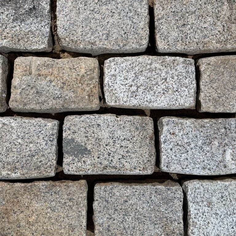 Color/Finish variation image for Reclaimed New England Cobblestones - Jumbo Wide Side. The surface finish shown is . Dominant colors shown are gray and greige. The color mix creates a warm feeling.