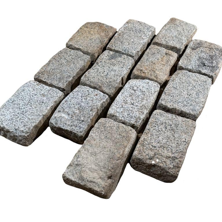 Oblique image for Reclaimed New England Cobblestones - Jumbo Wide Side. The surface finish shown is . The dominant color shown is gray. The color mix creates a cool feeling.