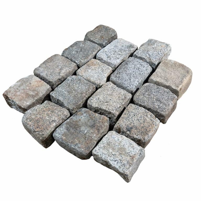Oblique image for Reclaimed New England Cobblestones - Medium Wide Side. The surface finish shown is . The dominant color shown is gray. The color mix creates a cool feeling.