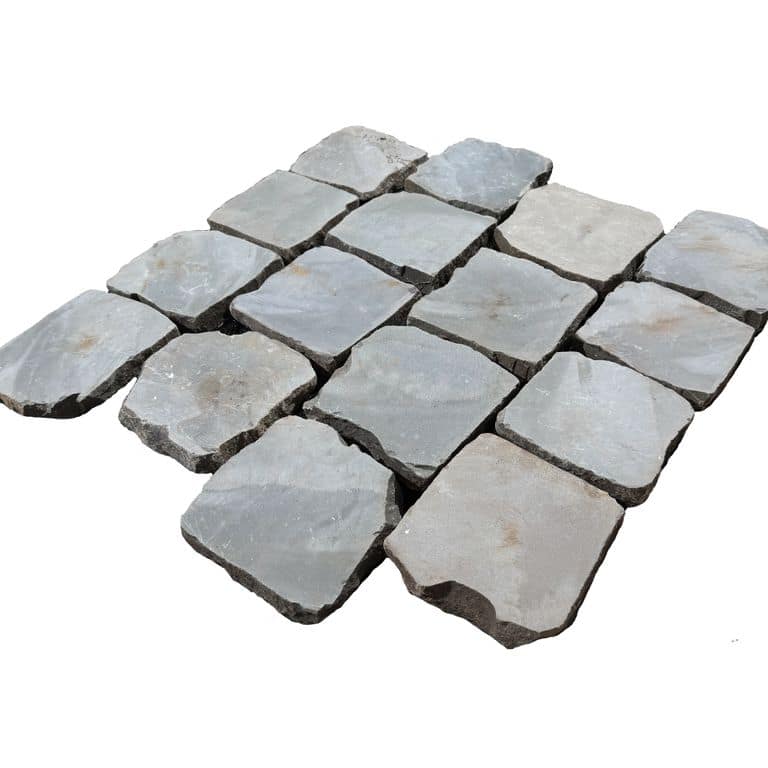 Feature image for Reclaimed European Sandstone Cobblestones - Square - Flat Surface Interior Flooring. The surface finish shown is sawn. Dominant colors shown are brown and gray.