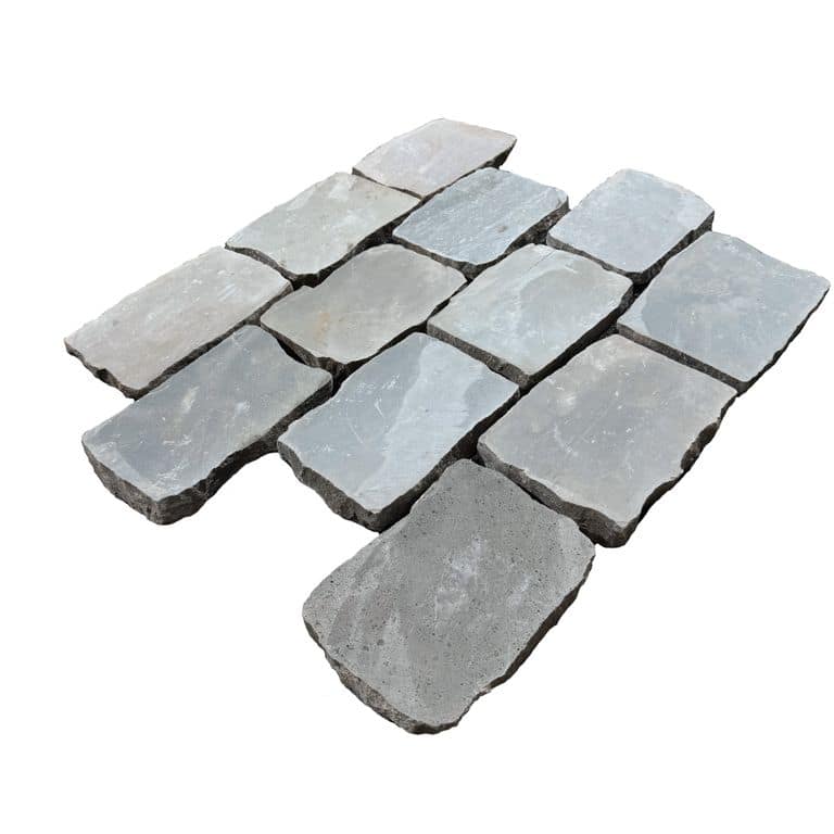 Feature image for Reclaimed European Sandstone Cobblestones - Rectangle - Flat Surface Interior Flooring. The surface finish shown is sawn. Dominant colors shown are brown and gray.