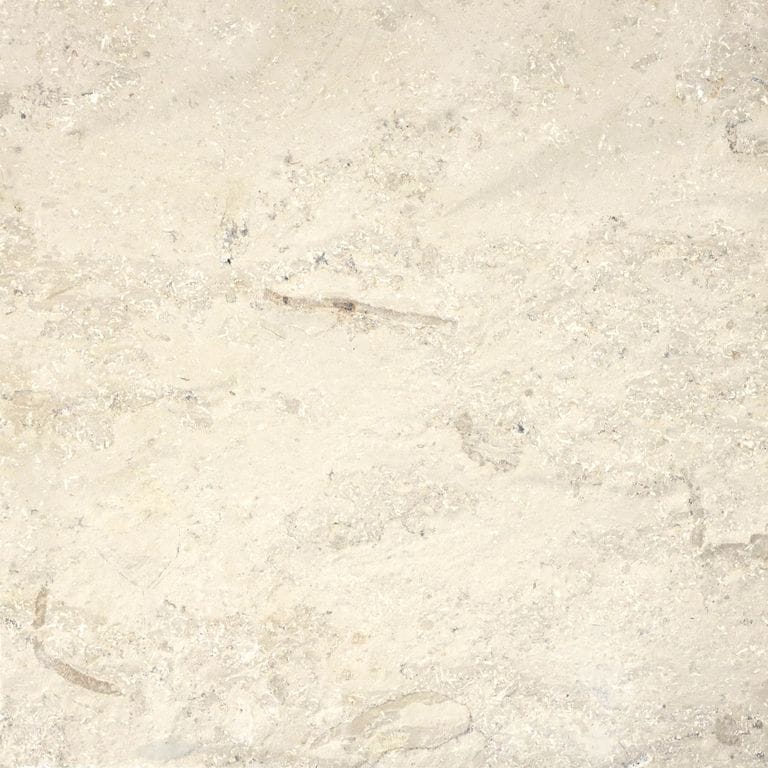 Color/Finish variation image for Bavarian Beige Limestone - Wall Cladding. The surface finish shown is split-face. Dominant colors shown are beige and gray; with pink, purple, white and tan secondaries. The color mix creates a warm feeling. Random color pattern.