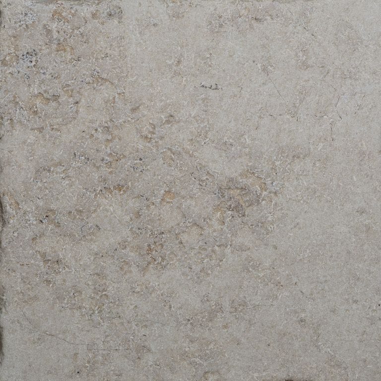 Swatch image for Bavarian Beige Limestone - Antiqued Interior Flooring. The surface finish shown is antiqued. Dominant colors shown are beige, tan and cream. The color mix creates a warm feeling.