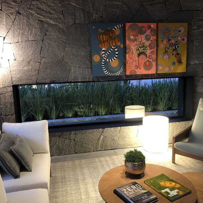 Application image for Brazilian Lucerna Gneiss - Interior Wall Cladding. The image shows this product being used in an interior cladding application. The surface finish shown is split-face. The dominant color shown is gray. The color mix creates a warm feeling.