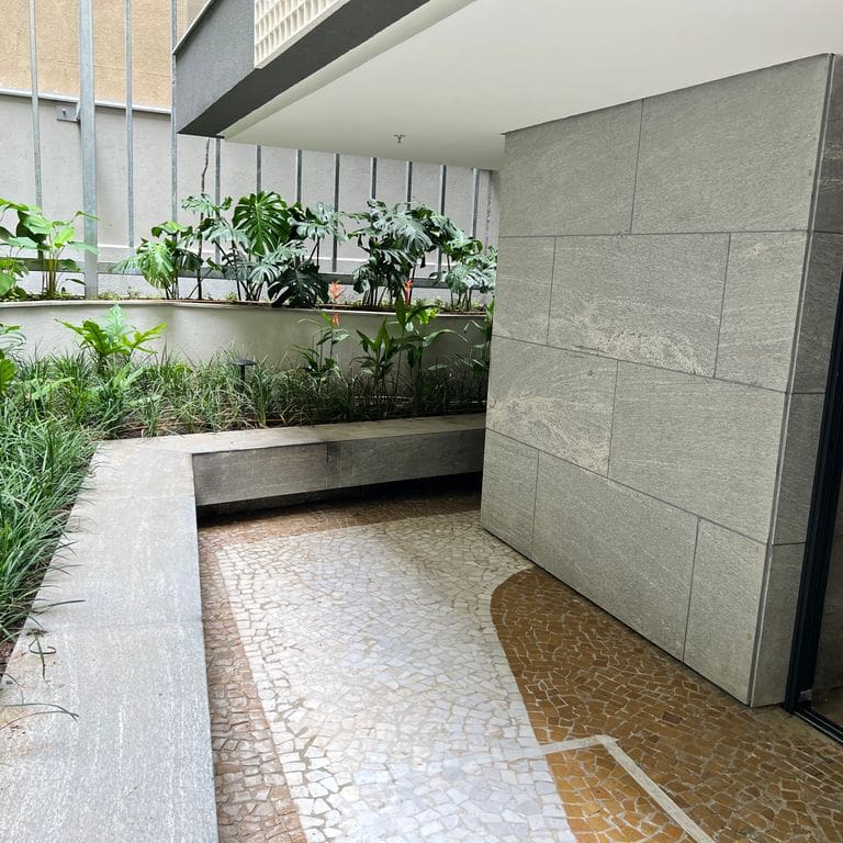 Application image for Strata Mist Vein-Cut Gneiss - Benches. The image shows this product being used in a seating &amp; benches application. The dominant color shown is gray. The color mix creates a cool feeling.