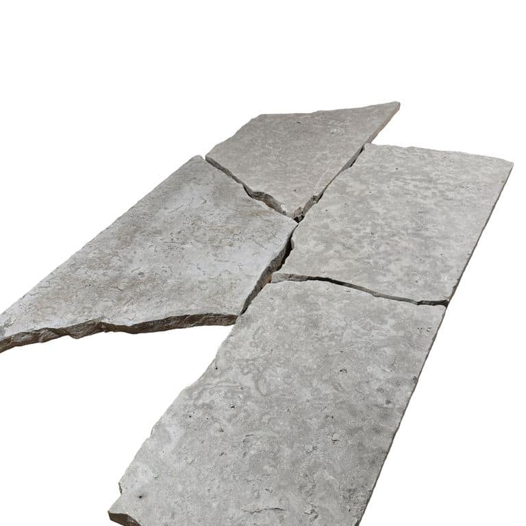 Oblique image for Madison Limestone - Irregular Pavers. The surface finish shown is flamed. The dominant color shown is gray. The color mix creates a cool feeling.
