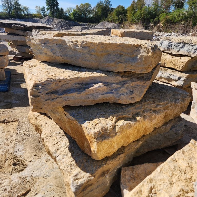 Application image for Rustic Gold Limestone - Wallstone. The surface finish shown is natural cleft. Dominant colors shown are yellow, tan and cream. The color mix creates a warm feeling.