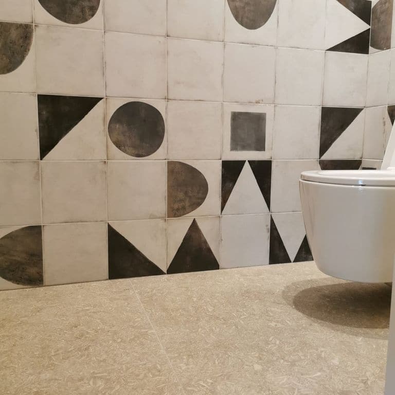 Application image for Veneto Olivo Limestone - Interior Flooring. The image shows this product being used in an interior floor application. The surface finish shown is . Dominant colors shown are beige and tan. The color mix creates a warm feeling.