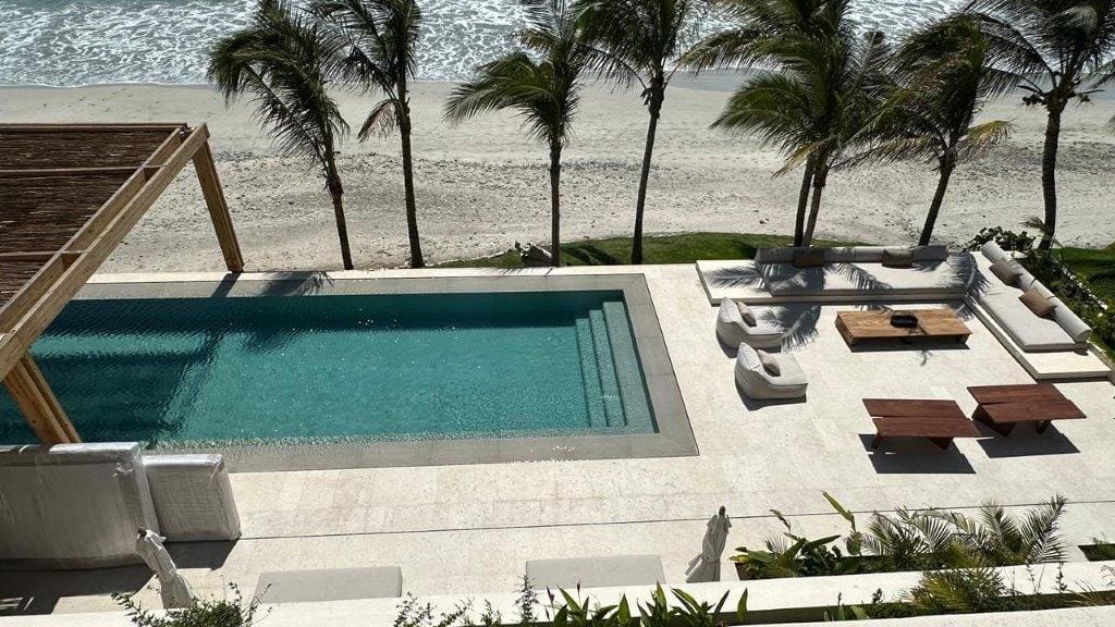 Application image for Veneto Beige Limestone - Pool Coping. The image shows this product being used in a pool deck pavers application. The surface finish shown is sand blasted. The dominant color shown is beige.