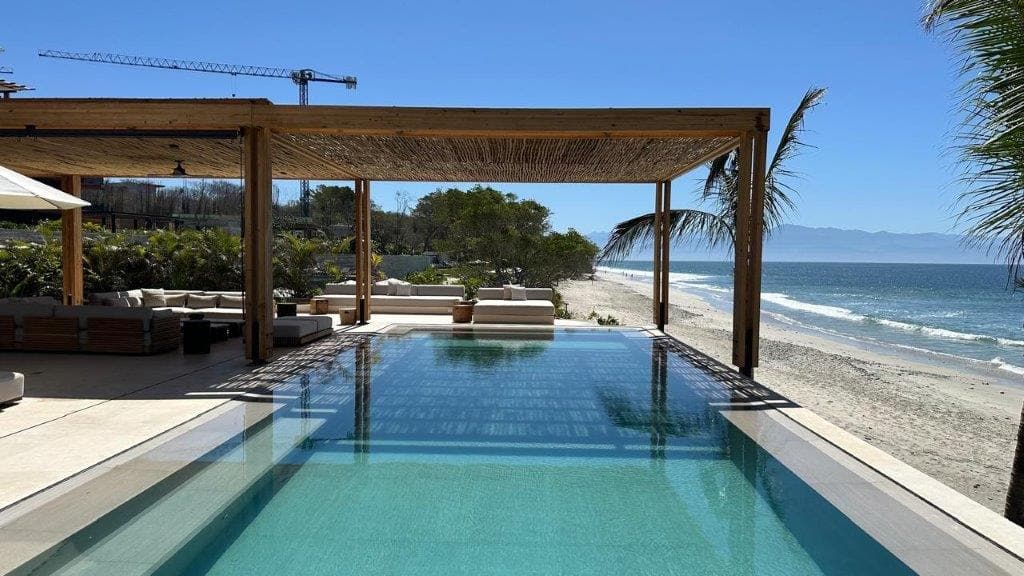 Application image for Veneto Beige Limestone - Pool Coping. The image shows this product being used in a pool deck pavers application. Dominant colors shown are beige and cream. The color mix creates a warm feeling.